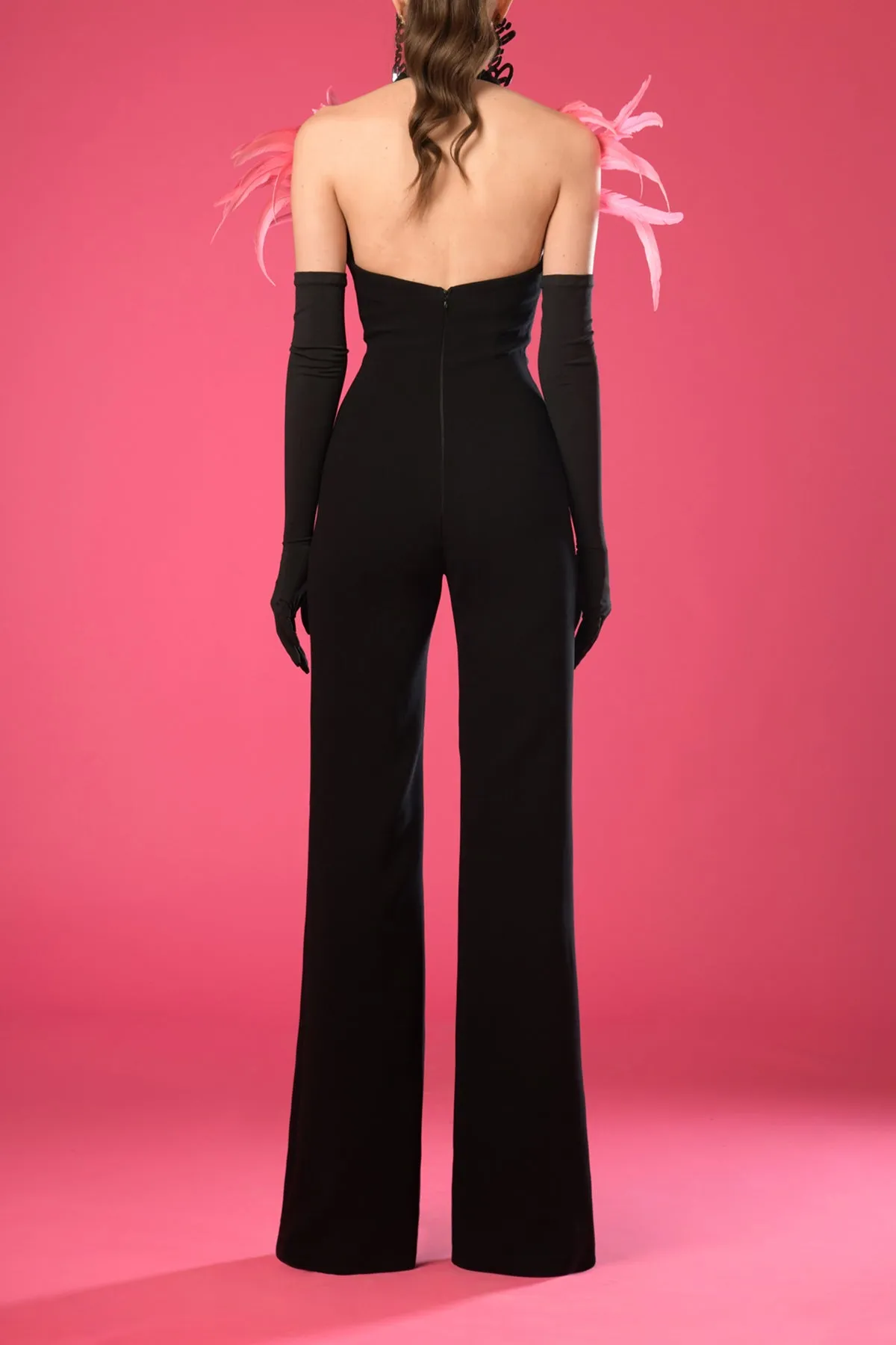 Black crêpe jumpsuit with feathers